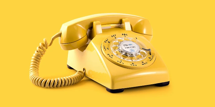yellow rotary telephone
